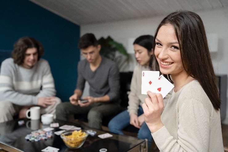 m friends having fun while playing poker